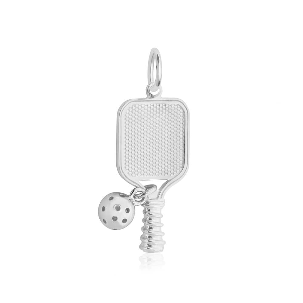 Silver pickleball racket and ball charm by Jet Set Candy, featuring engraved details on a white background.
