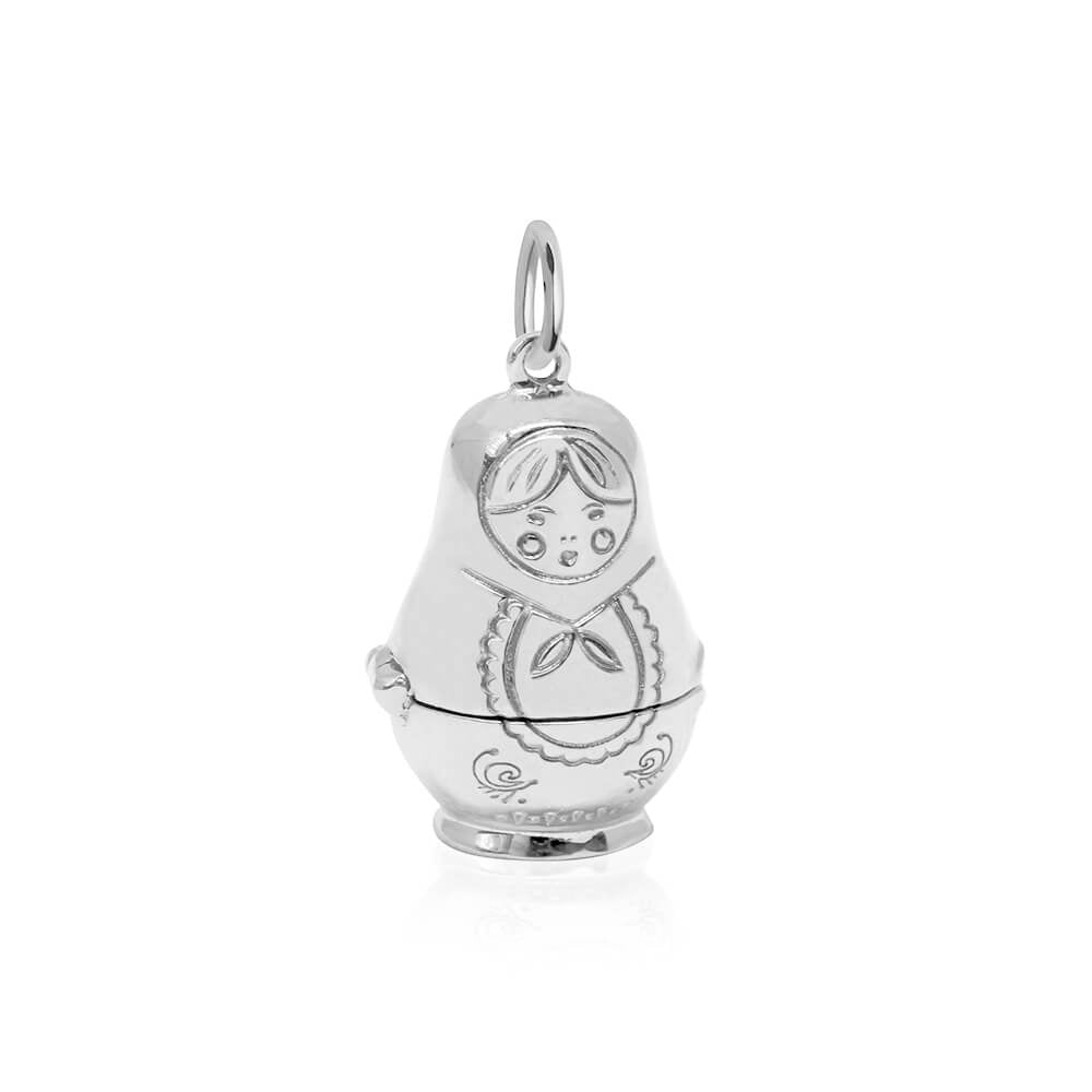 Sterling silver Russian nesting doll charm by Jet Set Candy, showcasing detailed engravings and traditional nesting design on a white background.