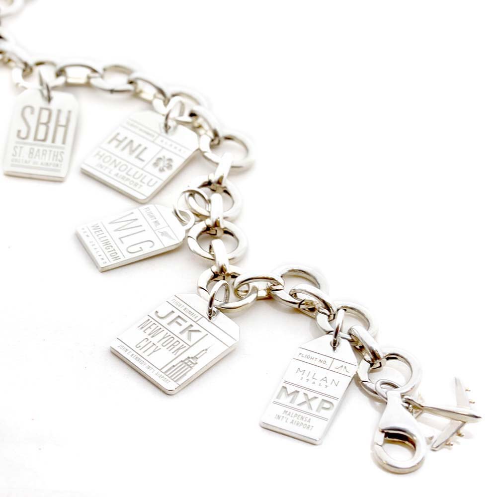 SILVER CHARM BRACELET WITH 12 LUGGAGE TAG CHARMS (SHIPS JUNE) - JET SET CANDY  (4401052647512)