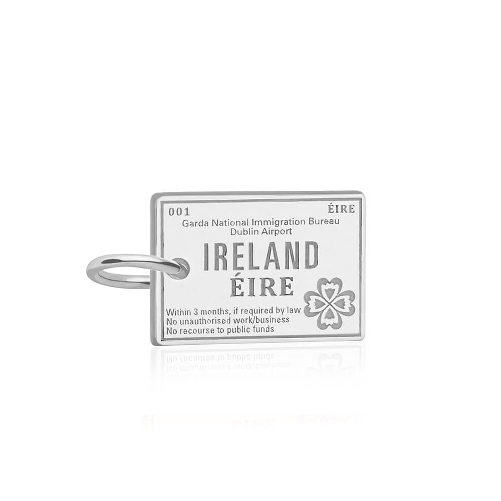 Silver Ireland passport stamp charm by Jet Set Candy, featuring engraved date and location details on a white background.