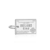 Silver Ireland passport stamp charm by Jet Set Candy, featuring engraved date and location details on a white background.