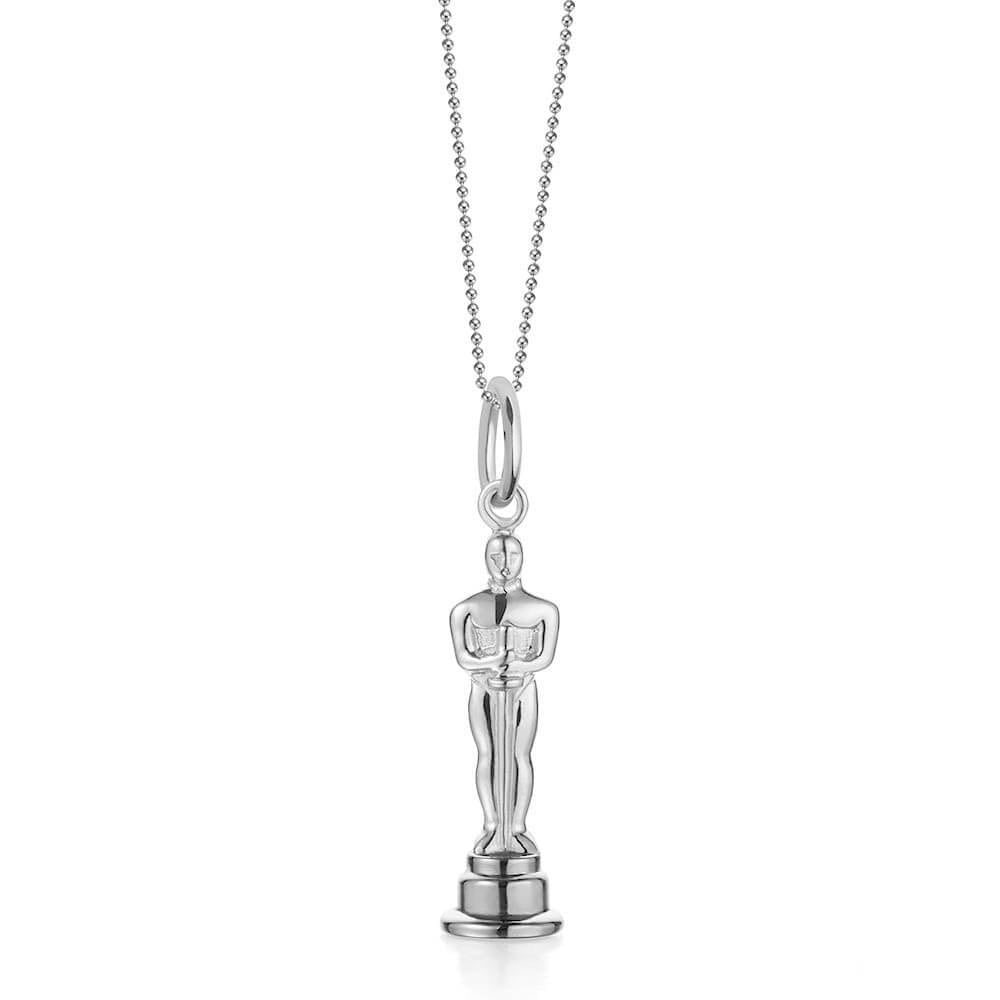 Silver Hollywood award statue charm necklace by Jet Set Candy, displayed on a delicate chain on a white background.