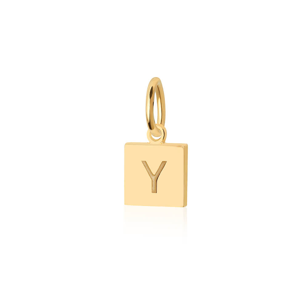 Gold charm featuring a small square tag design with a polished finish and a centered engraved letter Y.
