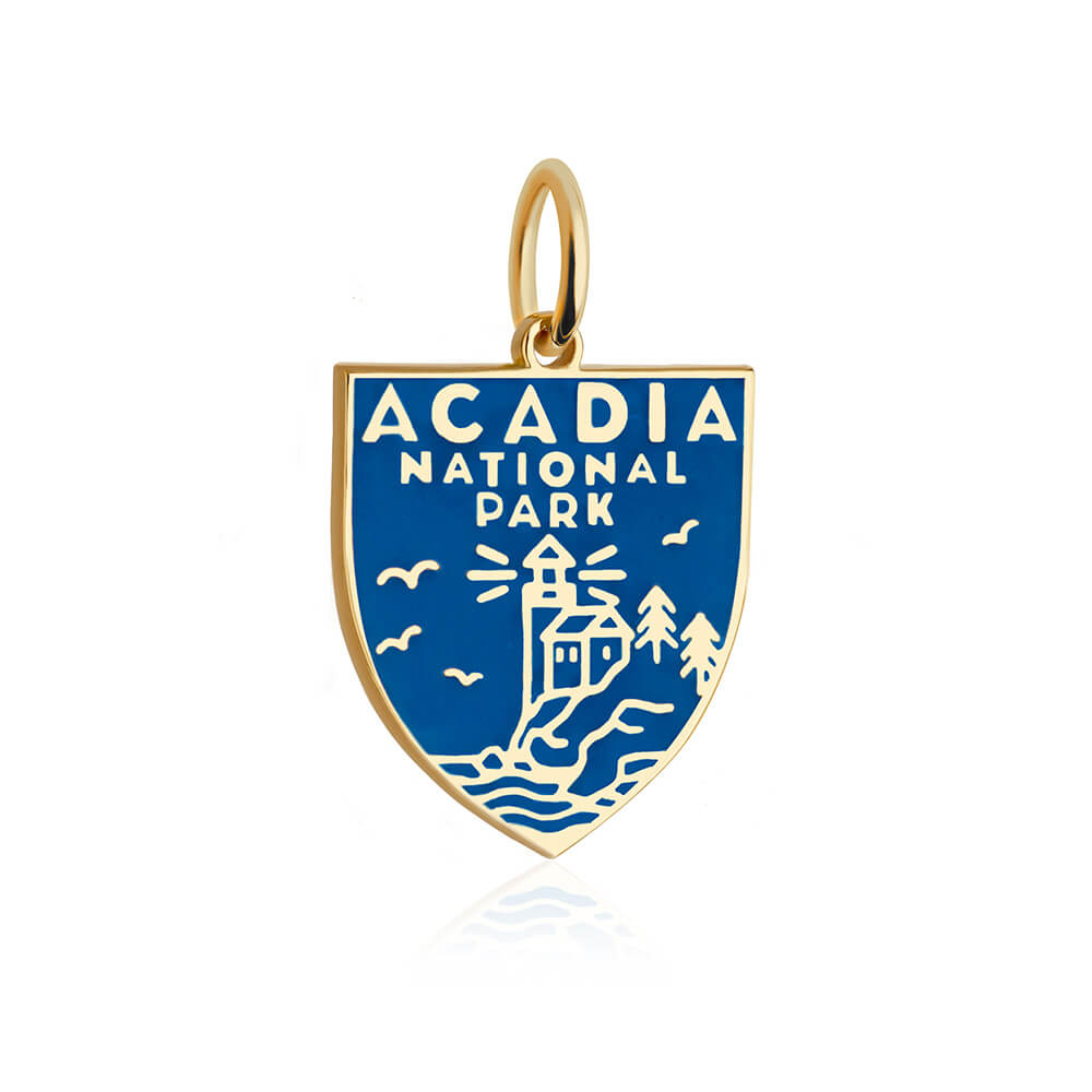 gold vermeil solid gold blue enamel shield shape acadia national park charm