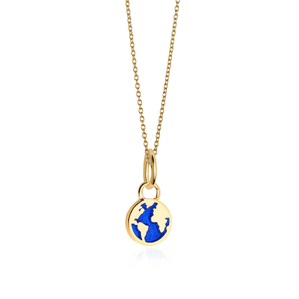 Gold mini globe charm with blue enamel detailing on a thin gold link chain necklace by Jet Set Candy.