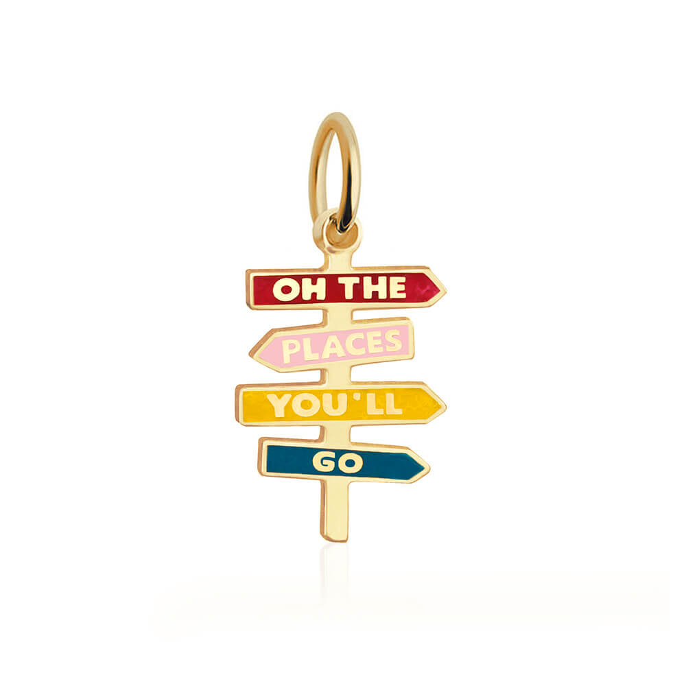 Gold enamel charm with "oh the places you'll go" inscription by Jet Set Candy, featuring vibrant colors on a white background.