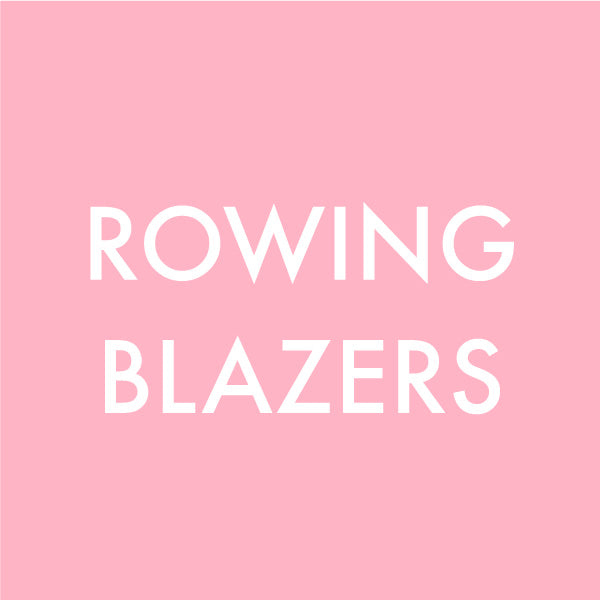 Enamel charm featuring white Rowing Blazers text on a pink square background, designed with a clean and modern aesthetic.