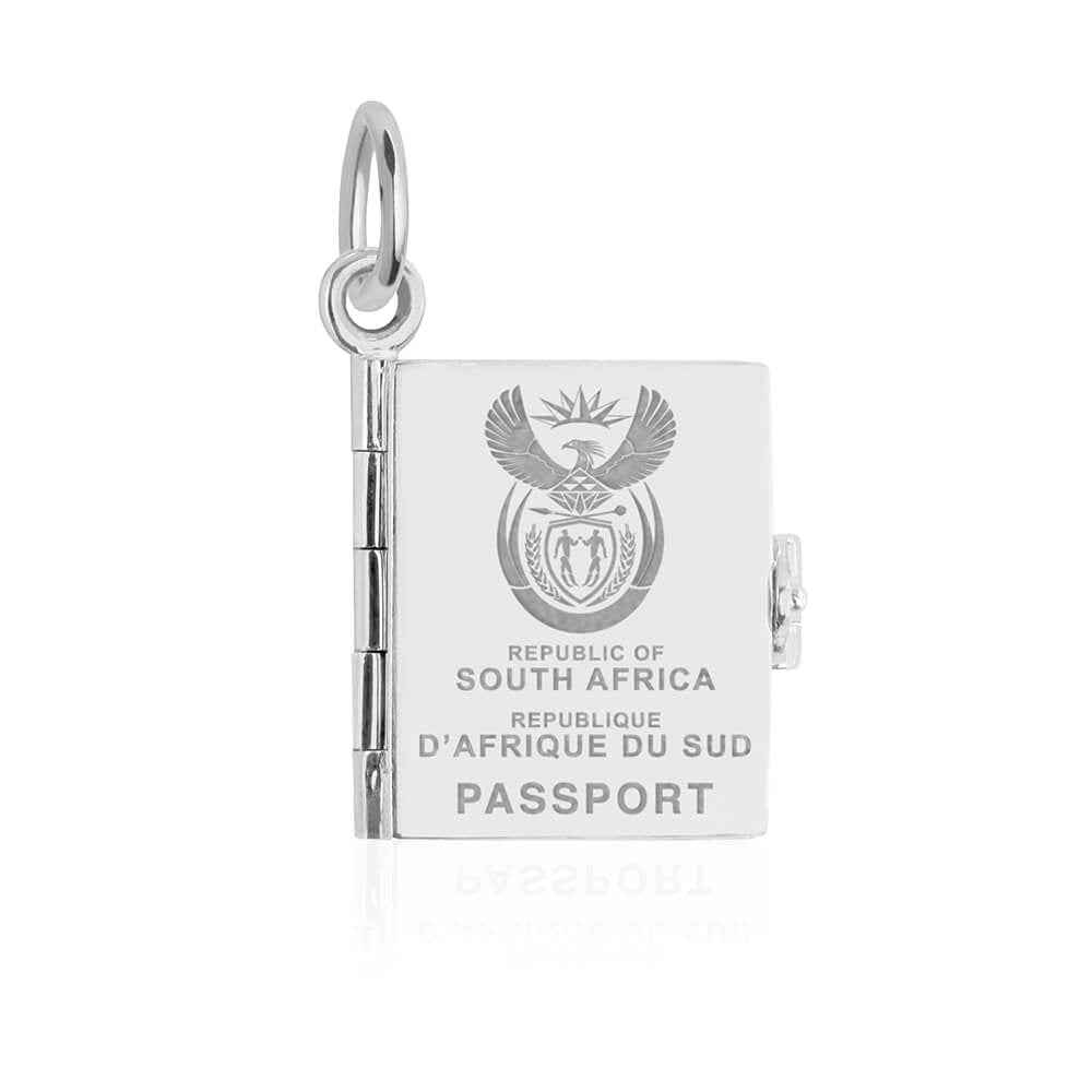 Silver South Africa passport book charm by Jet Set Candy, featuring engraved details on a white background.