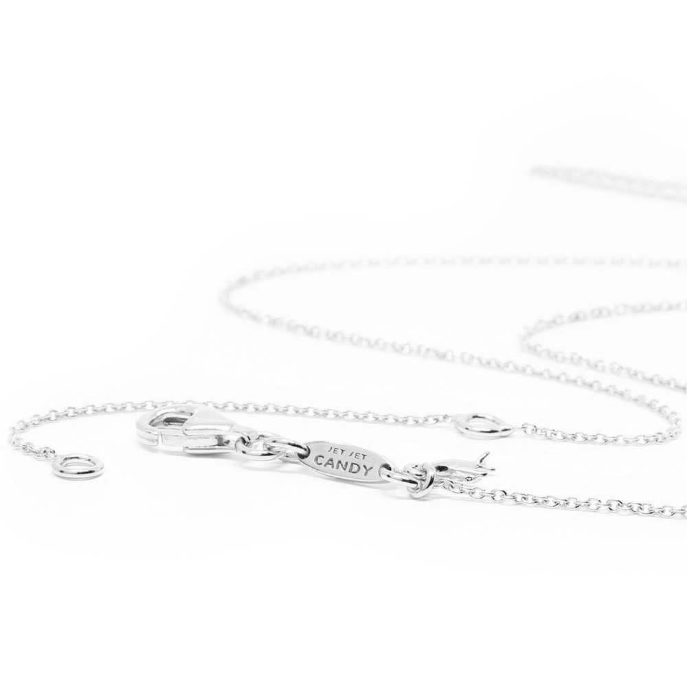 Silver adjustable cable chain by Jet Set Candy, displayed with an elegant clasp on a white background.