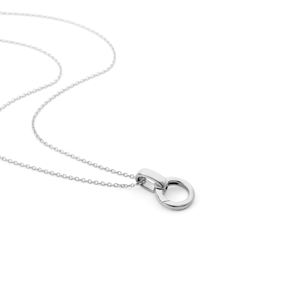 Animated silver cable chain with charm holder by Jet Set Candy, showcasing its versatile clasp mechanism.