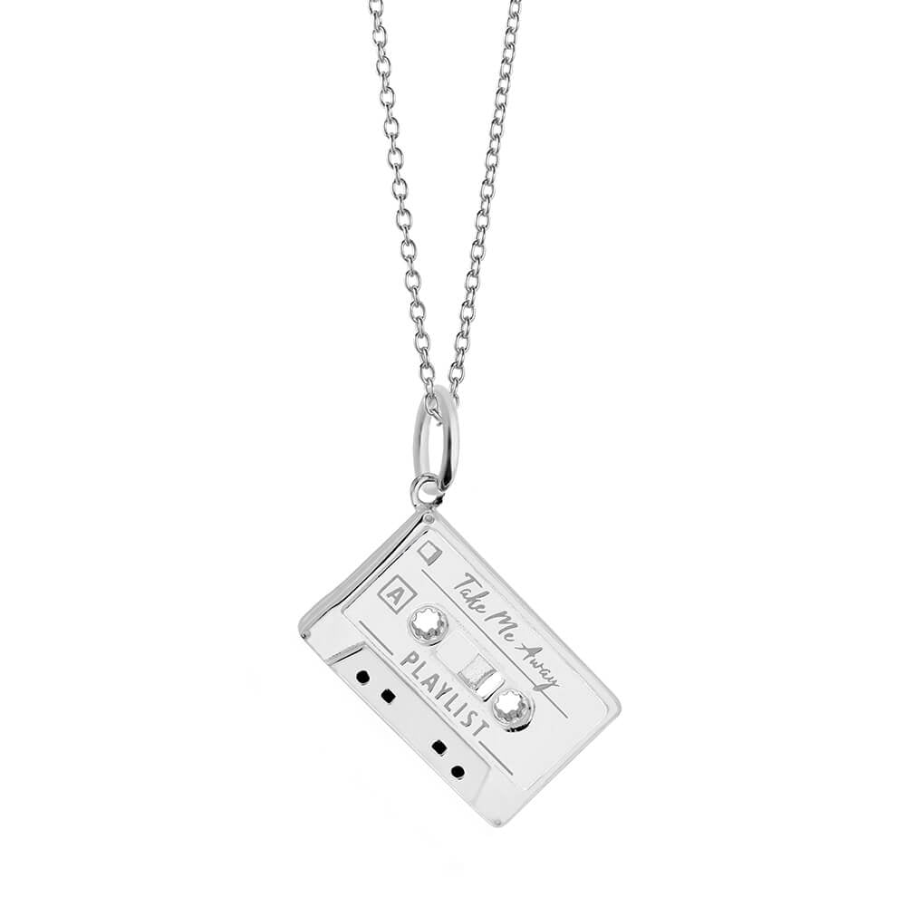 Silver cassette tape necklace by Jet Set Candy, featuring 'Take Me Away' engraving on a white background.
