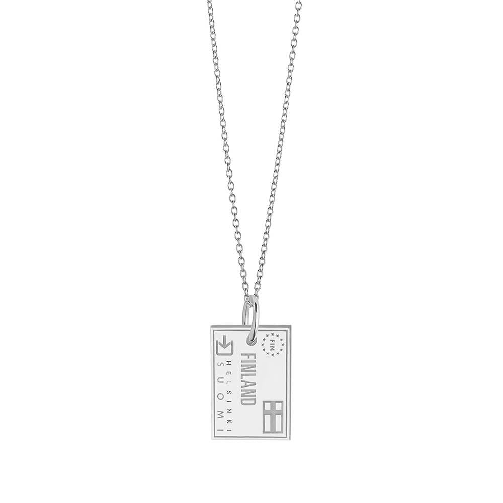 Sterling Silver square tag charm featuring Finland passport stamp engraving with Helsinki Suomi text, airplane motif, and FIN stars.