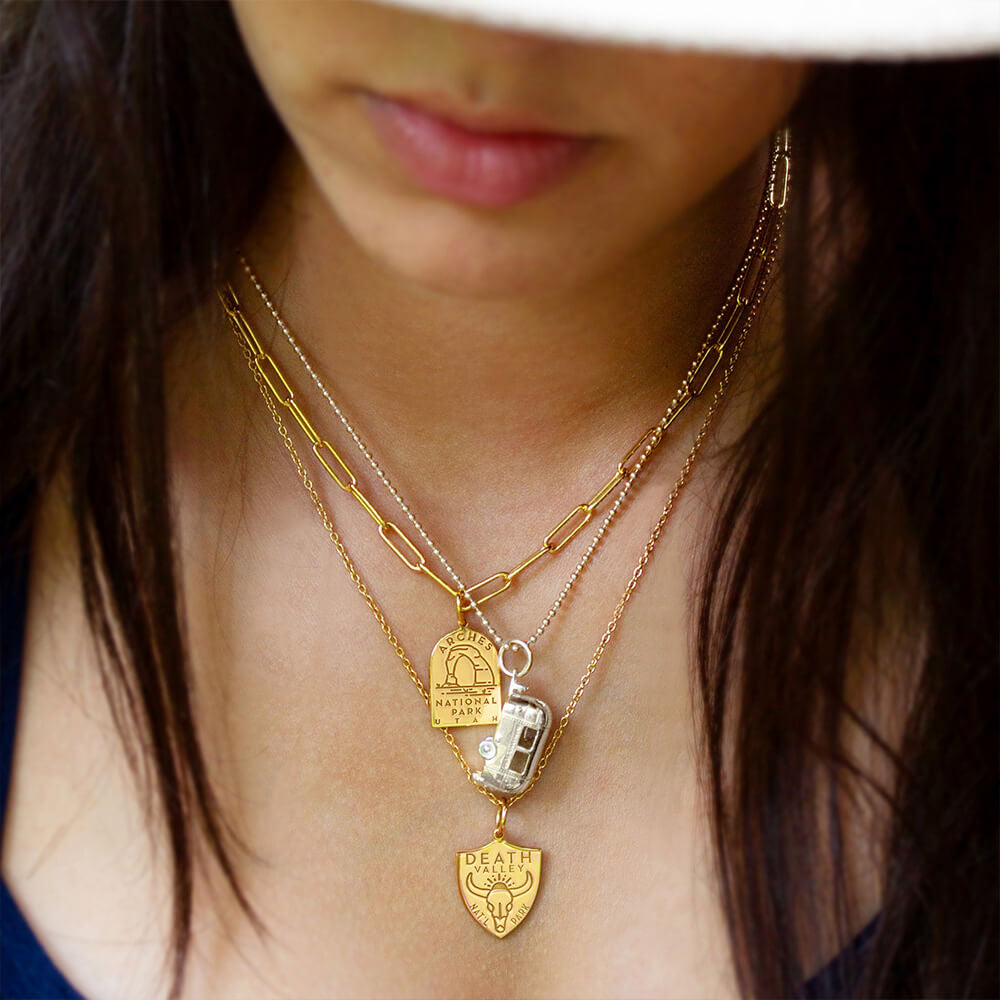 Paperclip gold vermeil necklace with Arches national park engraved charm, sterling silver ball chain with trailer charm, gold vermeil cable chain  with death valley national park gold vermeil charm