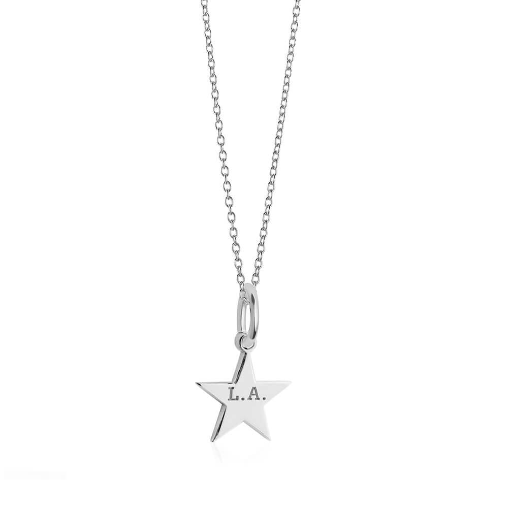 Sterling Silver star charm featuring L.A. engraving, polished five-point design, and delicate link chain necklace with silver finish.