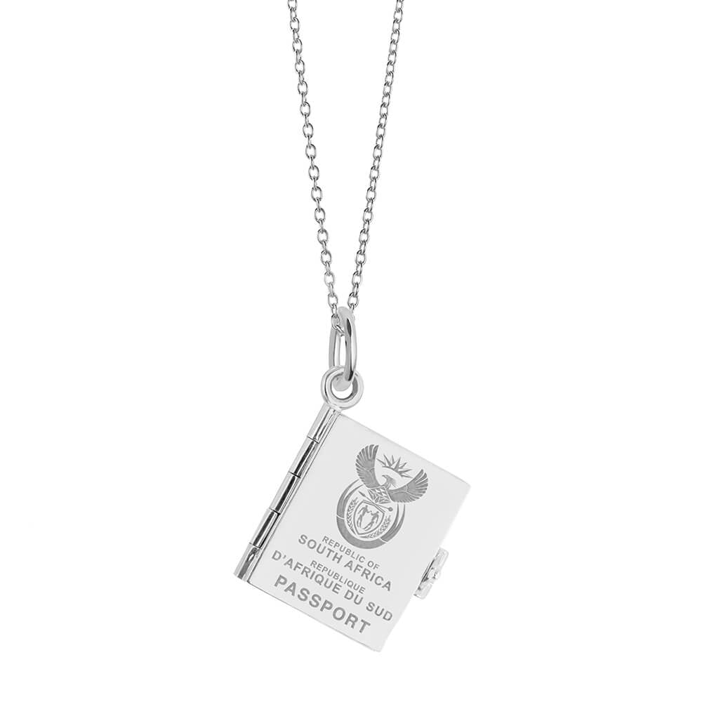 Silver South Africa passport book necklace by Jet Set Candy, featuring a travel-inspired charm on a white background.