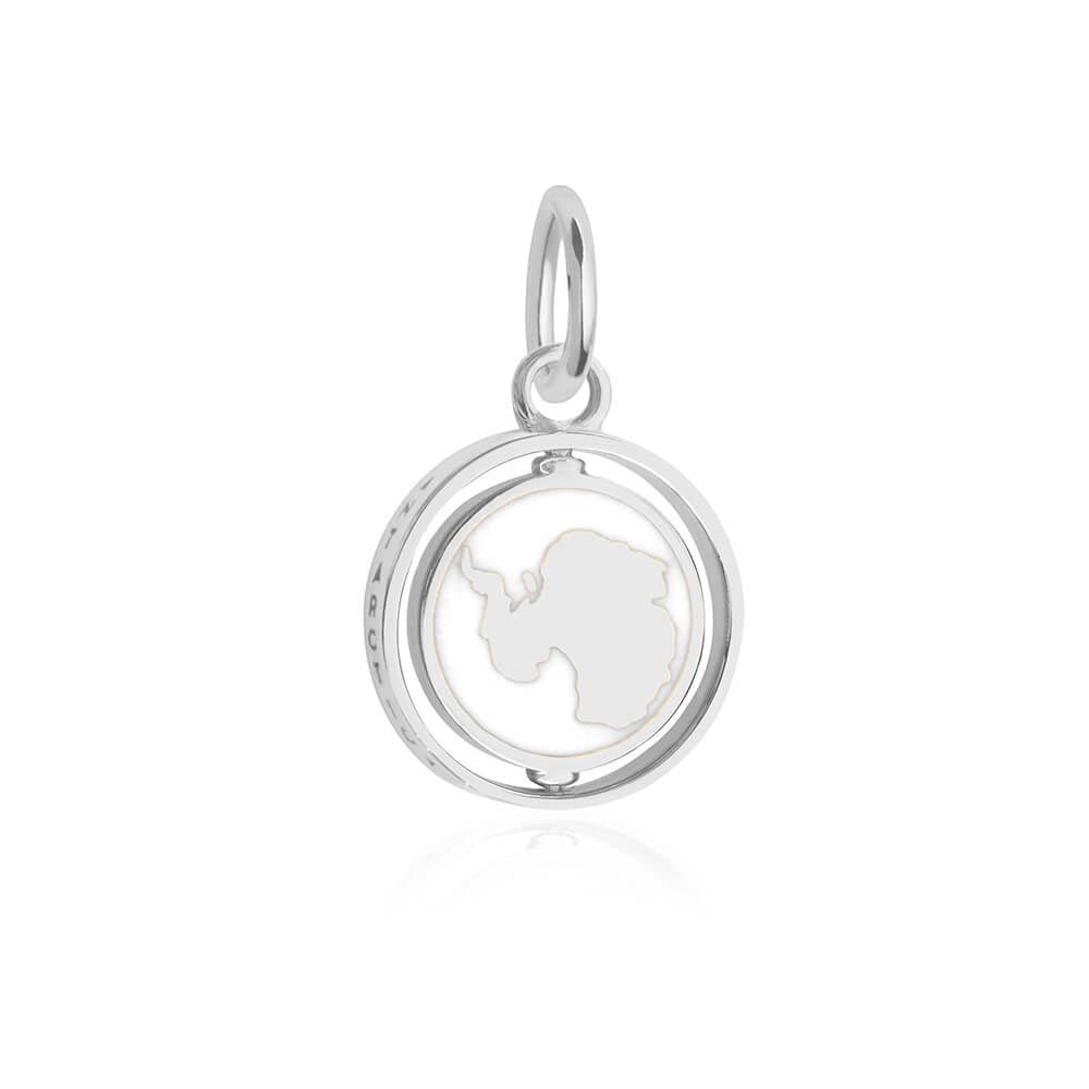 Sterling Silver spinner charm featuring a circular frame with white enamel Antarctica continent motif and ANTARCTICA side engravings.