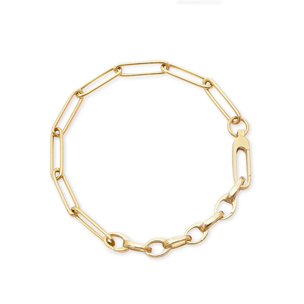 Gold paperclip chain bracelet featuring a mix of elongated rectangular and small oval links with a large lobster clasp.