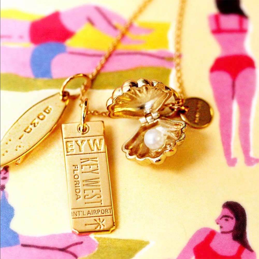 Gold Clamshell Charm - JET SET CANDY (1720176869434)