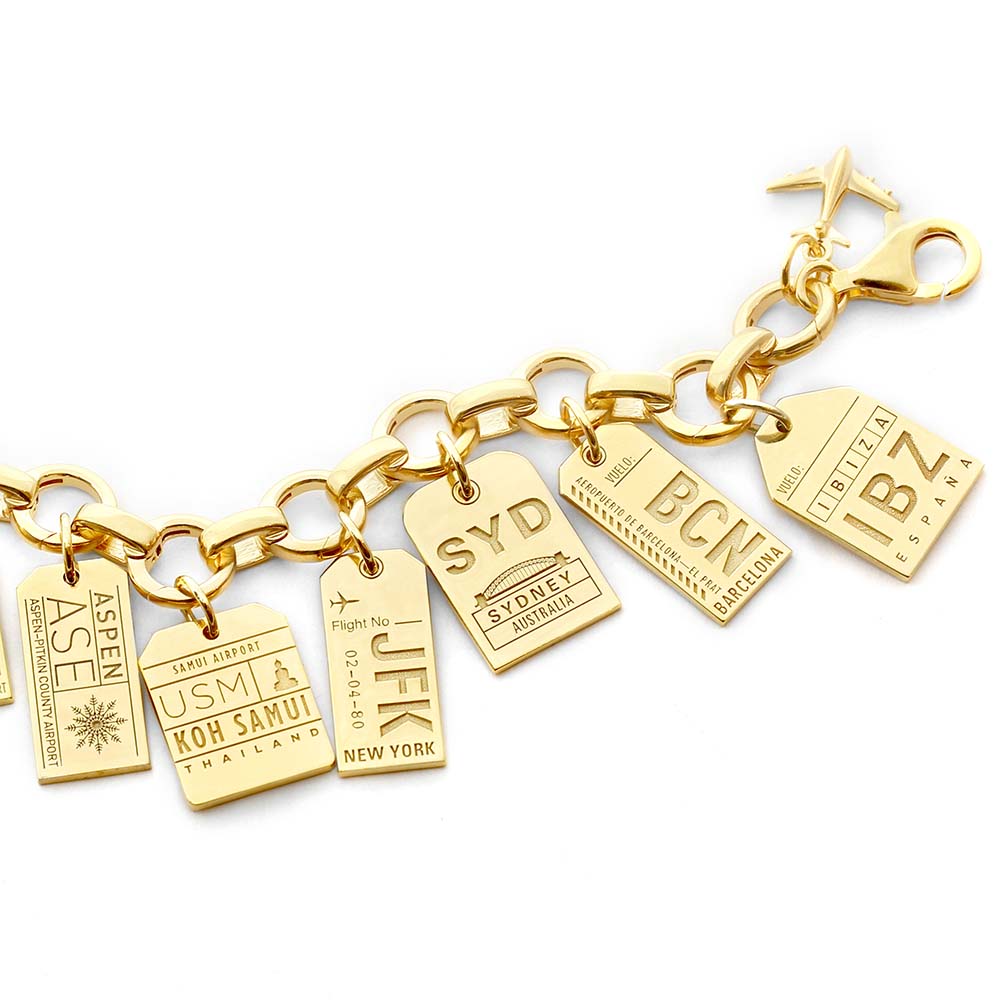 GOLD CHARM BRACELET WITH 12 LUGGAGE TAG CHARMS (MINI PLANE SHIPS JUNE) - JET SET CANDY  (4401092821080)