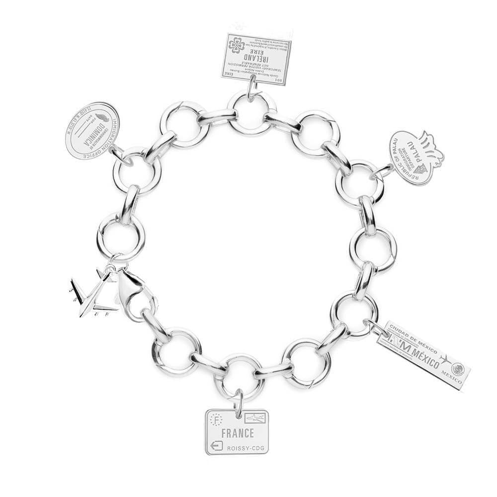 SILVER CHARM BRACELET WITH 5 PASSPORT STAMP CHARMS (SHIPS JUNE) - JET SET CANDY  (4401043865688)