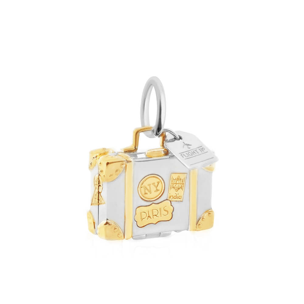 Silver and gold vintage suitcase travel charm from Jet Set Candy, displaying fun vintage designs on a white background.