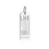 Silver London England LHR Luggage Tag Charm from  JET SET CANDY on a white background. The charm includes engravings of LHR and London England as well as 