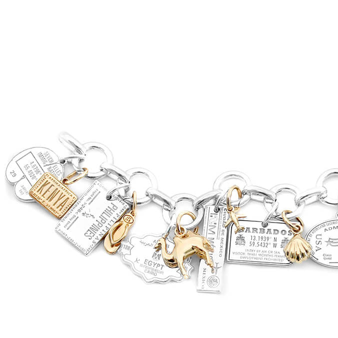 SILVER AND SOLID GOLD CHARM BRACELET BUNDLE (4401063592024)